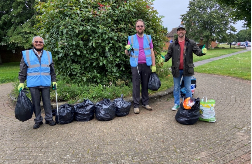 Conservative Action Team Members Hareshkumar Bhalsod and Peter Edwards joined residents (including James) to clean up Bedfont